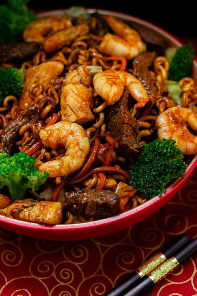 pexels lucasandrade 30992297 A plate of steak and shrimp with broccoli in a red bowl
